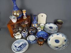 A mixed lot including a display case containing a quantity of miniature tea wares,