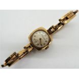 A lady's 9ct gold cased wristwatch on 9ct gold expanding bracelet, Swiss 15 jewel movement,