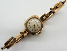 A lady's 9ct gold cased wristwatch on 9ct gold expanding bracelet, Swiss 15 jewel movement,