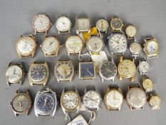 A quantity of lady's and gentleman's vintage watch heads.