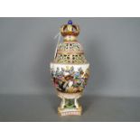 A European ceramic pot-pourri vase and cover,