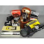 Photography - A quantity of cameras and accessories to include a Zeiss Ikon Contina, Olympus,