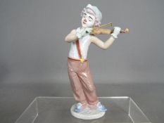 Lladro - A Lladro figurine from the Utopia Collection entitled 'Bohemian Melodies' # 8239,