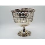 A silver plate pedestal bowl with pierced decoration and swing handle, Mappin, standing 11.