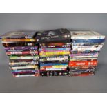 A collection of DVD's, predominantly feature films.