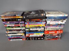A collection of DVD's, predominantly feature films.