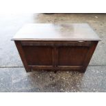 A linen chest with carved decoration, approximately 57 cm x 90 cm x 46 cm.