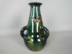 A Elton Ware triple handled vase,