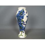 Moorcroft - a Moorcroft vase decorated in the delphinium pattern,