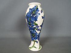 Moorcroft - a Moorcroft vase decorated in the delphinium pattern,