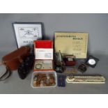 A mixed lot of collectables to include cased binoculars,