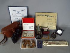 A mixed lot of collectables to include cased binoculars,