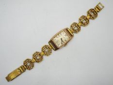 A 9ct gold cased wristwatch, the signed dial marked 'Everite',