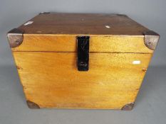 A vintage metal bound chest, approximately 37 cm x 48 cm x 38 cm.