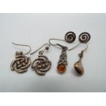 Two pairs of silver earrings plus 2 single silver earrings all marked 925, total weight approx 7.