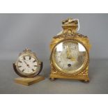 A French brass cased clock,
