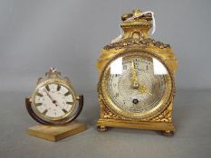 A French brass cased clock,