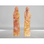 Two soapstone carvings depicting a scholar, each approximately 9.5 cm (h).