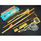 A collection of vintage sporting equipment and games to include a Hardys fishing rod,