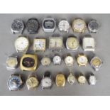 A quantity of vintage watch heads, lady's and gentleman's.