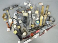 A quantity of wristwatches, lady's and gentleman's, with a small quantity of parts.