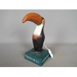 Breweriana - a cast iron model in the form of a toucan, marked 'Guinness', approximately 20 cm (h).