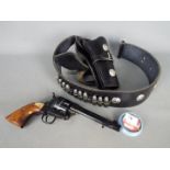 Blank firing pistol with good quality belt and holster and tub of 6mm blank cartridges.