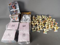 A quantity of boxed Michelle Allen cups and saucers decorated with cats and a collection of Enesco