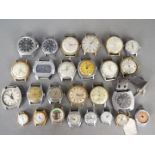 A collection of vintage wristwatch heads, lady's and gentleman's.