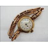 A lady's 9ct gold cased wristwatch on expanding 'Britannic' bracelet,