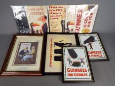 Breweriana - a collection of Guinness posters and signs, varying sizes.