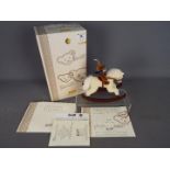 Steiff - a Steiff Teddy Bear with Rocking Horse, # 037337 issued in a Limited Edition.