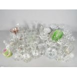 A quantity of mixed glassware to include uranium glass, branded whisky tumblers, dishes and similar.