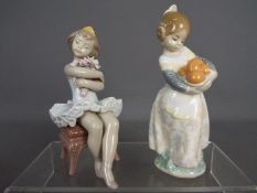 Lladro - Two Lladro figurines comprising 'First Performance' # 6763 and 'Valencian Girl' # 4841,