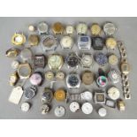 A quantity of various watch heads, movements, cases, parts and similar.