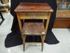 Furniture - A vintage children's wooden school desk and stool with hinged lid,