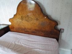 A double bed frame with walnut veneered headboard, originally purchased from Harrods.