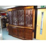 A large mahogany breakfront bookcase by Gill & Reigate, London,