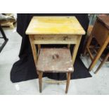 Furniture - A small children's wooden school desk with stool,