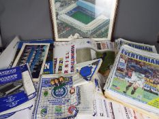 A box of memorabilia and ephemera relating to Everton Football Club including papers, brochures,