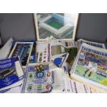 A box of memorabilia and ephemera relating to Everton Football Club including papers, brochures,