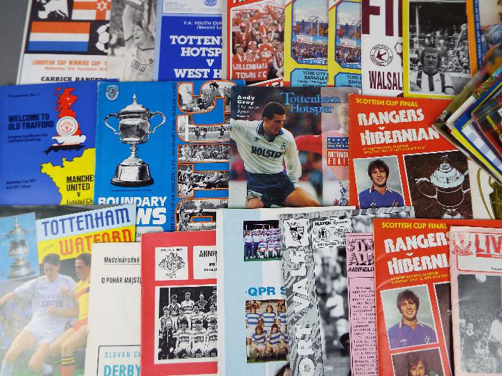 Football - a good collection in excess of 50 matchday programmes with many interesting examples to