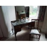 A walnut veneered dressing table on cabriole supports with triptych mirror and chair,