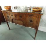 A good quality serpentine front sideboard with protective glass top,