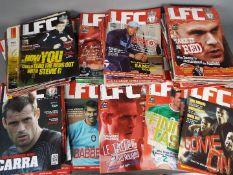 A large quantity of Liverpool Football Club Official Magazines.