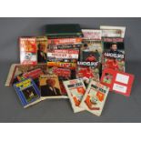 Manchester United - two boxes containing a large collection of memorabilia, books, yearbooks,