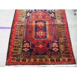 A large Persian runner measuring approximately 121 cm x 310 cm All items must be paid for and