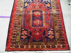 A large Persian runner measuring approximately 121 cm x 310 cm All items must be paid for and