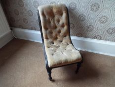 A vintage button back nursing chair.