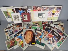 A collection in excess of 30 colour and black and white images of famous former footballers